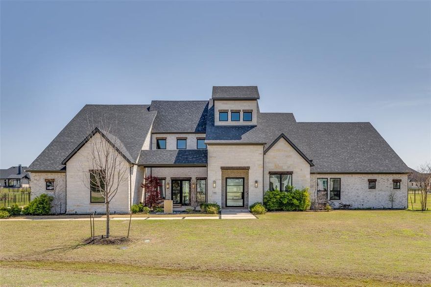 Exquisite J. Anthony Home with Stunning Design and Backyard Oasis!
Discover unparalleled luxury in this meticulously designed 1.5-story home by renowned builder J. Anthony. Nestled on a prime corner lot in the highly sought-after Lovejoy ISD, this home offers an exceptional floor plan with thoughtful details throughout.
Step inside to spacious elegance, where soaring ceilings, premium finishes, and an open-concept design create an inviting atmosphere. The main level features a lavish master suite with a hidden room inside the primary closet, four additional bedrooms, a private study, a theater room, a game room, and a dedicated workout room. Upstairs, you'll find a secluded guest retreat with a bedroom and full bathroom, perfect for visitors or multigenerational living.
The heart of the home is the seamless indoor outdoor living experience. Multi-slide glass doors in the living room open to your backyard oasis, complete with a sparkling pool and spa, an outdoor covered kitchen, gas fire pit, and even a private sauna, perfect for both relaxation and entertaining.
This extraordinary home is nothing short of perfection, offering an ideal blend of comfort, elegance, and functionality. Don’t miss the opportunity to own a dream home in one of the most desirable communities!