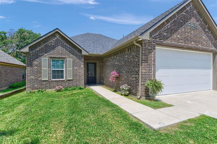Welcome to this charming, newer brick home that offers the perfect blend of convenience, comfort, and style! Located just minutes from Texoma Medical Center, this home is ideal for healthcare professionals or anyone working nearby. With no HOA, PID, or MUD fees, you can enjoy a worry-free lifestyle while being close to everything you need.

This spacious home features a bright, open layout with an abundance of natural light that floods every room. The heart of the home is the inviting kitchen, equipped with stunning granite countertops, perfect for both cooking and entertaining. The seamless flow between the kitchen, dining, and living areas creates a warm and welcoming atmosphere, ideal for family gatherings or quiet evenings at home.

The master suite is a true retreat, offering a luxurious garden tub, separate shower, and double vanity, creating the perfect spa-like experience. The guest bathroom is thoughtfully designed with a separate area for the shower and toilet, ensuring privacy and convenience for visitors. 

Outside, you'll find a large, fenced backyard on a desirable corner lot, offering plenty of space for pets, play, or outdoor gatherings. The screened-in back porch is a peaceful spot to relax and enjoy the view of the lovely wooded area that backs up to the property. Mature trees provide shade and a beautiful backdrop, making this a perfect outdoor oasis.

This one-owner home has been well-maintained and is move-in ready. Located near excellent restaurants, shops, and amenities, it offers both the tranquility of a private retreat and the convenience of city living. Whether you're looking to unwind in the backyard or take a short drive to work, this home checks all the boxes. Don't miss the opportunity to make it yours! Contact your local REALTOR to schedule your showing today.