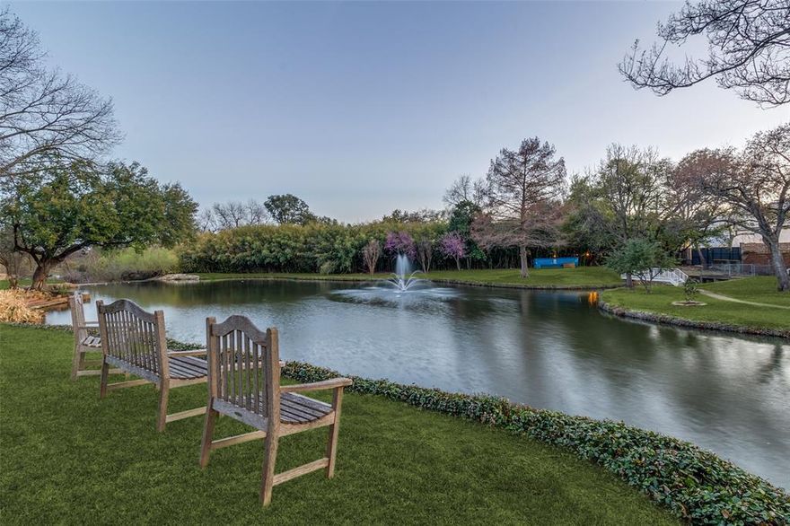 Rare lakeside retreat in the private 15-home enclave of Timberlake Gardens, just south of LBJ and adjacent to North Preston Hollow. This 5,537-sq-ft residence offers serene lake and fountain views from nearly every rear-facing window, creating a peaceful setting rarely found in North Dallas. The spacious 3-bedroom, 3-bath home features soaring ceilings, hardwood floors, a marble fireplace, built-ins, and dramatic windows that fill the living spaces with natural light. The kitchen is equipped with granite countertops, Sub-Zero refrigeration, Thermador appliances, and opens seamlessly to the den and dining areas. The oversized primary suite offers a sitting area, balcony overlooking the lake, and a beautifully remodeled spa bath. Additional features include an elevator, theater room, dry sauna, office with built-ins and beverage fridge, and wine storage for approximately 1,100 bottles. Enjoy private walking paths and direct gated access to Preston Forest shopping and dining, just steps from Cooper Aerobics Center—an ideal opportunity for luxury downsizing in a premier North Dallas location.