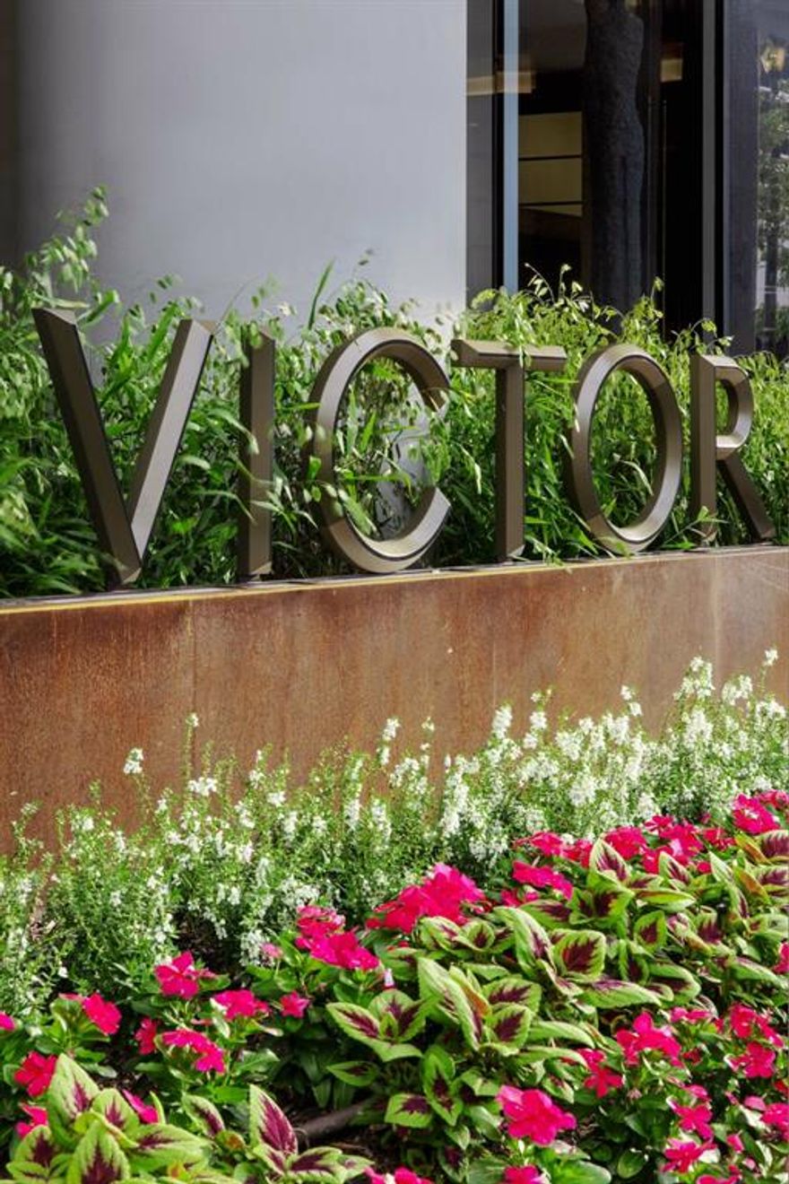 Influenced by the city’s incredible museums and Design District, living at The Victor is living among art. The spaces are accented by feature art installations from designers around the world. The design team has choreographed the seamless integration of inside and outside amenities, views and materials, which ground the building in its urban setting. The Victor not only sits in the center of Dallas, it aspires to become its own cultural center for residents to call home. The Penthouses at The Victor present a selection of six spacious floor plans ranging from 1,595 to 2,695 square feet with up to three bedrooms and flex spaces. Everything has been hand-selected with you in mind, including modern floor plan designs, upgraded Kitchen Aid appliances and smart-home capabilities. Floor-to-ceiling windows ensure downtown city views day to night, co-work space with private meeting rooms, dedicated town hall space, fitness center, lap pool, complimentary coffee bar plus so much more.