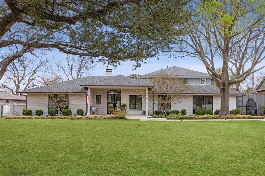 Welcome to the grace and charm of 7114 Azalea Lane. This lovely family home, completely renovated by Barringer Custom Homes in 2016, offers a rare blend of timeless character and modern livability. Tucked beneath mature trees on a beautiful, established street in one of Dallas’ most desirable neighborhoods, this home's charming curb appeal and manicured landscaping set the tone for what awaits inside.

Designed with both everyday living and effortless entertaining in mind, this home blends warmth, functionality, and refined style. When you step inside, you're greeted by sunlit living spaces that flow gracefully from one to the next, enhanced by sophisticated finishes and thoughtful details. The tranquil lounge and living area opens to formal dining and blends beautifully into the cozy family room with fireplace and walls of French doors overlooking the pool and grounds. A second living area down provides a game and media room. With four distinct living areas, this home provides room to unwind, entertain, or create lasting memories.

At the heart of it all, the kitchen is a chef’s dream, with a large island and breakfast bar, gorgeous countertops, six-burner gas range, and abundant storage. Its open layout connects to the main living areas, making it a hub for daily routines and special occasions. The wet bar, complete with a wine fridge adds extra convenience for hosting.

The first-floor primary provides a serene retreat with a well-appointed bath and ample closet space. Adjacent to the primary is a working office and exercise room that offers a flexible space. Three bedrooms upstairs share a fourth living area. Every detail in this home has been carefully considered to create a comfortable, elevated living experience.

Step outside to a peaceful backyard oasis. A beautiful pool and spa are adjoined by a covered pergola with outdoor kitchen and fireplace. The large patio space and fenced grass yard offer ample space for kids or pets to play.