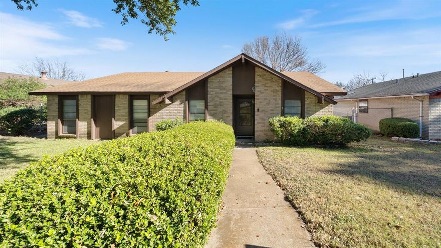 Welcome to 7020 Nandina Drive in Dallas, Texas! This traditional home offers a flexible and functional layout featuring two spacious living areas, a cozy wood-burning fireplace, and four well-sized bedrooms. The kitchen shines with all new stainless steel appliances, providing a modern touch while maintaining the home’s classic charm. Step outside to enjoy a covered back porch, perfect for relaxing or entertaining, while two large mature trees provide ample shade to help beat the Texas summer heat. The property includes a two-car garage plus an additional two-car carport with alley access, offering plenty of parking and storage options. Conveniently located between I-35W and Highway 45, this home offers easy access to major highways, shopping, dining, and commuting routes. Move-in ready and presents a fantastic opportunity to add value over time. Whether you’re looking for a comfortable primary residence or a grab-and-hold rental investment, 7020 Nandina Drive is full of potential and ready for its next chapter.