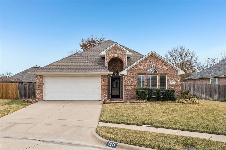 Tucked at the end of a peaceful cul-de-sac in the exclusive gated community of Shady Valley West, this beautifully maintained 3-bedroom, 2-bath home delivers an abundance of privacy, space, and convenience. Inside, a fresh canvas awaits. Walls are newly painted with stylish neutral colors. Plush new carpet in the bedrooms softens every step. The heart of the home is the spacious open living area, bathed in natural light and centered around a warm, inviting fireplace. It’s an ideal space to unwind after a long day or host friends and family. The kitchen is both functional and welcoming, featuring a walk-in pantry, breakfast bar, and an eat-in dining nook that keeps the conversation flowing from morning coffee to evening meals. The split-bedroom floor plan offers quiet separation, with the generously sized primary suite tucked away in its own wing. A walk-in closet, dual vanities, and a separate tub and shower highlight the en suite bathroom. Step outside and you’re just minutes from Arlington’s best attractions, including Cowboys Stadium, Globe Life Park, Texas Live, and Six Flags. Golf lovers will appreciate proximity to both Lake Arlington Golf Course and Shady Valley Country Club. Plus, access to major highways makes for an easy drive to DFW Airport or a convenient commute to either Dallas or Fort Worth. This single-owner home has been lovingly cared for and is ready for its next chapter.