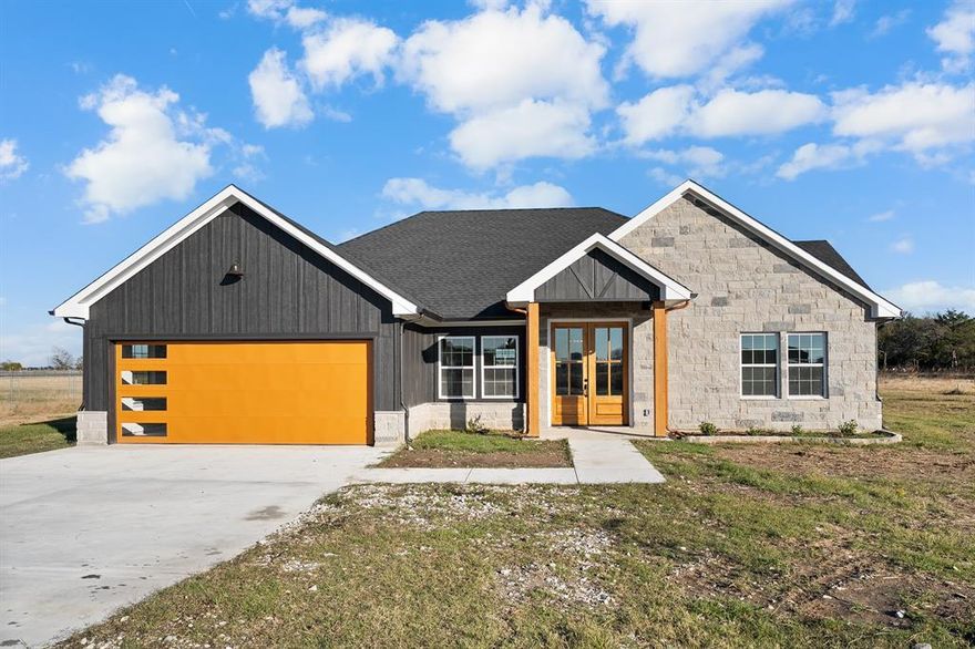 Welcome to your brand-new 2025 custom home on 1.2 acres in peaceful Kaufman! Step through the grand double wooden doors into an open concept floor plan featuring luxury vinyl plank flooring throughout, soaring ceilings, and an oversized island perfect for gatherings. The kitchen boasts plenty of prep space and modern finishes, seamlessly flowing into the living and dining areas for easy entertaining.

Enjoy covered front and back patios, ideal for morning coffee or relaxing evenings overlooking your private acreage. Built with efficiency and quality in mind, the home includes spray foam insulation and an aerobic septic system for long-term savings and comfort.

This beautifully designed new build combines modern style with country serenity just a short drive from downtown Kaufman.