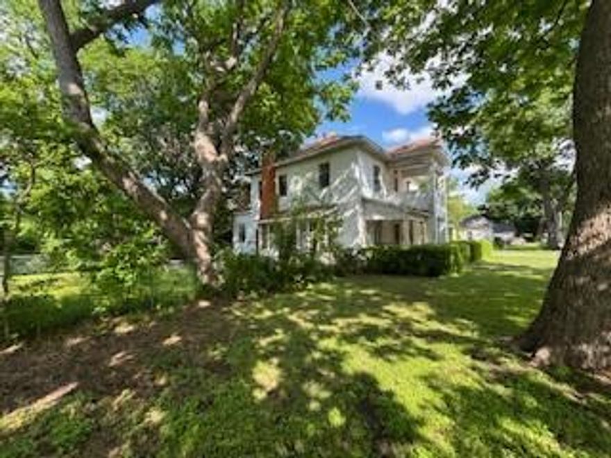 Huge Price Drop! Remodelers & Developers Wanted!!!! Bring your creative ideas to make this you dream home on just under an acre, this oversized corner lot is located adjacent to Waxahachie’s West End historic district. Shaded by mature pecan trees and just blocks from the charming downtown square, this property is what developers or remodelers have been waiting for. Bring all your best ideas! Back fenced lot INCLUDED in this sale.
The existing home is being sold AS IS, along with a large workshop nearly the size of the main house. Both structures are ideal candidates for remodel or tear down with a build potential. Shop serves as valuable storage space while you finalize for your project plans. The workshop has 3 phase power.
Whether you're envisioning a remodel, custom home, a multi-unit development, or something uniquely your own, this location offers outstanding potential in a high-demand area. Potential, Potential, Potential! City Water, Sewer, Electrical and Gas on property. Call Agent to schedule your walk through today!