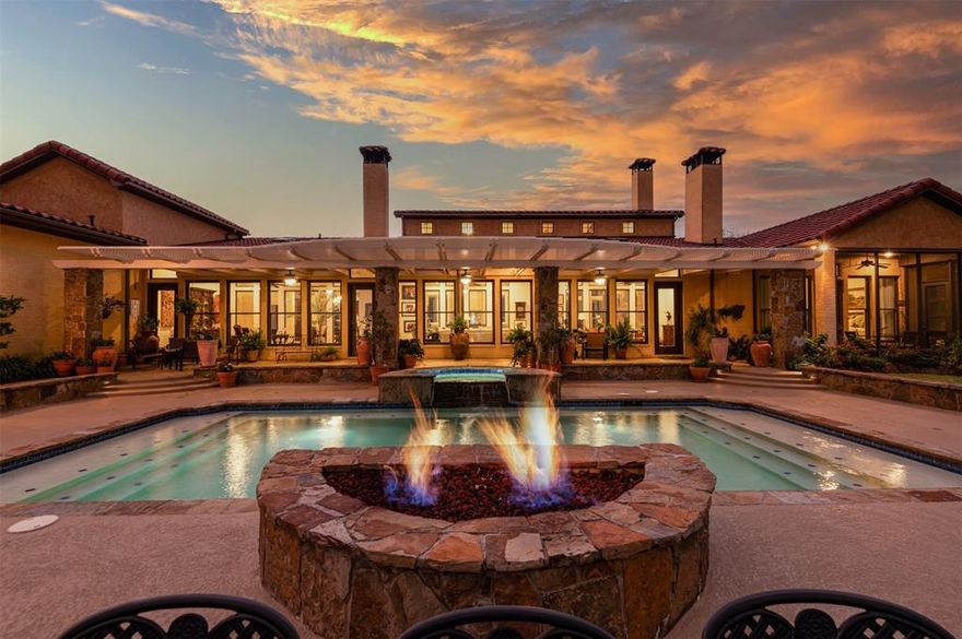 Enter gated entry & follow winding paved drive to luxury, hilltop Spanish-Mediterranean estate home overlooking 111ac of expansive, manicured, pipe-fenced, gently rolling pastures & woodlands. Breathtaking views, 3-ac fishing lake, 1 ac-pond. Private 4 BR barndo guest quarters and more. While ranch scenery is impressive, abundantly diverse & improved land provides cattle grazing, hay production & rich wildlife habitat for Whitetail Deer, waterfowl, & dove. Sophisticated & classic accommodations for family & guests boasting multiple formal & informal living & dining spaces w central gourmet kitchen. Spacious retreat-like primary bedroom & guest rooms w private baths share library study & screened porch. Terraced outdoor living with heated pool & spa, outdoor cooking center & lava firepit for outdoor entertaining & relaxing. Improvements include cattle working pens & large hay barn that could convert to equine. Space to roam & enjoy the great outdoors on this beautiful East Texas ranch.