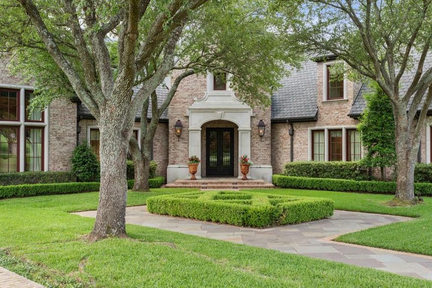 Welcome to timeless elegance in one of the most sought-after gated neighborhoods. This beautifully maintained, well-built traditional home offers four spacious bedrooms—each with its own en suite bathroom—blending comfort, privacy, and sophistication. Step inside to find stunning hardwood floors, rich solid wood doors, and classic trim details that exude craftsmanship throughout. The expansive main level features two inviting living areas, a formal dining room perfect for elegant entertaining, and a chef’s kitchen with abundant counter space, custom cabinetry, and exceptional storage. On the main floor, the primary suite is generously appointed with tons of windows, elegant finishes in the bathroom and complete with 2 large walk in closets. Also, downstairs is the guest room with a bathroom, Ralph Lauren would be envious of! Upstairs, two generous bedrooms are accompanied by en suite baths and a game room, ideal for recreation or relaxing with family. Oversized closets throughout the home offer premium storage options. The outdoor living space is equally impressive—designed for both entertaining and unwinding. Enjoy a tranquil spa and water fountain as the centerpiece of a beautifully landscaped backyard, complete with a covered living area. Every inch of this home has been lovingly cared for and thoughtfully designed with timeless style and enduring quality in mind. A true gem for those seeking luxury, privacy, and classic beauty in a secure, serene setting.