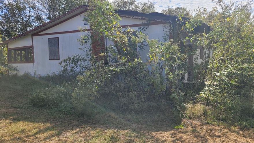 Located on a half acre this house sits just off Business Hwy 6.  With repairss it could be a comfortable semi-rual homestead. See the related MLS Number 20769520.