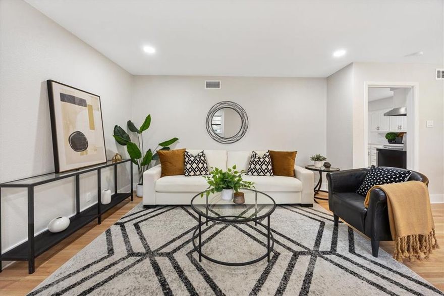 Beautifully updated home on a quarter acre lot in the heart of East Dallas, thoughtfully designed with a modern, cohesive aesthetic throughout with a recently updated roof. Light-filled living spaces feature neutral tones, warm original hard wood flooring, and contemporary finishes that create a clean yet inviting atmosphere. 

The kitchen offers white cabinetry, stainless steel appliances, a sleek tile backsplash, and ample quartz countertop space , flowing seamlessly into adjacent dining and living areas—ideal for everyday living and entertaining. The dining space is anchored by modern lighting and framed artwork, adding visual interest while maintaining an open feel.

Bedrooms are well-proportioned and styled with comfort in mind, while bathrooms showcase spa-inspired finishes, including a walk-in shower with designer tile and updated fixtures. Additional living areas provide flexible space for entertaining, relaxing, or working from home.

Outdoor light pours in through generous windows, enhancing the home’s bright and airy feel. Conveniently located near shopping, dining, and major thoroughfares like White Rock Lake, Dallas Arboretum, and Lockwood Park. This property offers a balance of modern style and everyday functionality in a desirable Dallas location.
Buyer and buyer’s representative to verify all information, including measurements, schools, and features.