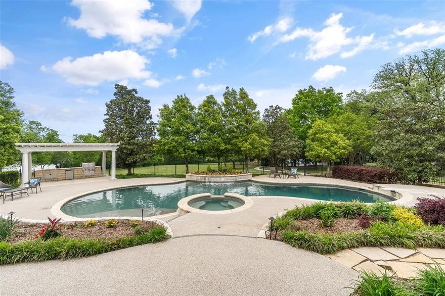 *Exclusive Offer* Sellers are offering a $25K allowance for buyers to put toward updates or renovations, making this estate an even greater value! Welcome to your retreat on approximately 10 acres of tranquil bliss. This estate blends luxury with comfort and offers endless entertainment. Enter through the electric gate and follow a winding driveway lined with mature trees and landscape lighting. At the heart of this outdoor paradise is a stunning pool and spa, perfect for relaxing or hosting. An expansive terrace with an outdoor kitchen invites al fresco dining while overlooking a pond and your private tennis and basketball court. The 4-car oversized garage features slatted paneling, epoxy flooring, a workshop and a home safe—combining practicality with security. Inside, the kitchen is equipped with a Subzero fridge, GE Profile double ovens, a walk-in pantry and nugget ice maker. The grand family room, with a gas fireplace and baby grand piano, sets the scene for cozy evenings. Entertain in style in the media room with a GE Monogram beverage center, or retreat to the master suite, where French doors reveal pool views. The master bath features a Kohler jetted tub and Mr. Steam shower with multiple sprayers.
Additional highlights include a study with built-ins, a spacious nook for meals and a game room with shuffleboard, pool table and planning center. The fitness room, with mirrored walls and rubber flooring, supports an active lifestyle. Beyond the main residence, a 700SF+ metal barn and lush pastures offer space for equestrian activities or hobbies. Enjoy the benefits of Sunnyvale ISD, known for its 100% graduation rate and ‘Superior Achievement’ financial rating, while embracing the privacy and lifestyle this estate delivers.