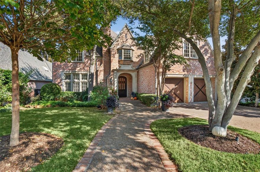 Beautifully updated home in the exclusive guard-gated community of Lake Forest. This residence blends luxury, comfort, and privacy, highlighted by a stunning forest-like backyard with a serene creek running through the backyard—an incredibly peaceful setting rarely found in Dallas.

Inside, bright open living spaces feature plantation shutters, crown molding, recessed lighting, and elegant architectural details. Multiple living areas and a formal dining room create an effortless flow for entertaining. The kitchen is a chef's delight, featuring stainless steel appliances, double ovens, and abundant cabinetry.

The primary suite is conveniently downstairs, providing a spacious retreat with room for a sitting area, dual walk-in closets, and a dressing vanity. The en-suite features a beautifully designed his-and-hers bathroom with separate vanities, separate toilet areas, and a shared dual-entry walk-through shower, along with a luxurious soaking tub. Upstairs, two additional large bedrooms offer great natural light, custom window treatments, and generous storage, plus flexible bonus spaces ideal for an office, media room, playroom, or 4th bedroom.

Over $800,000 in extensive upgrades include a full exterior repaint, enhanced landscaping, redesigned drip system, exterior lighting, gutter guards, porch improvements, new drapery and wallpaper, and motorized power shades. Major system updates include 3 complete high-efficiency HVAC replacements with all-new ductwork, attic flooring and insulation, two new water heaters with a recirculation system, whole-house surge protection, and upgraded electrical.

The backyard is the true highlight—lush, private, and wooded, creating the feel of a tranquil retreat while still minutes from premier shopping and dining.

Located in one of Dallas’s most desirable guard gated communities with 24-hour security, walking paths, lakes, tennis courts, pickleball, and pools, this home offers an exceptional lifestyle and convenience.