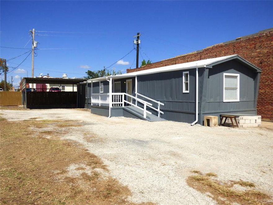 This move-in ready 1995 singlewide has 3 bedrooms, 2 bathrooms, 1216 sq ft and is located in the heart of downtown Cisco! If you're looking for a low maintenance home that will be easy to take care of, this is it. It has newer wood laminate flooring throughout, full size washer and dryer space in the utility room, a brand new metal carport, and very little grass to mow! This is priced to sell, so call me ASAP!