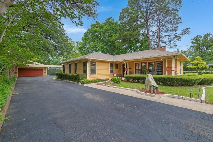 One-of-a-kind property in the Bell Ave. Historic District near TWU! Situated on a rare 0.73-acre double lot, this unique offering combines charm, flexibility, and opportunity. The property features a beautifully updated 3-bedroom, 3-bath ranch-style home, plus an additional vacant lot—perfect for building another home or expanding your vision. The main residence, known as the Kimbrough House, was built in 1945 and has been lovingly cared for by just three owners. Thoughtful updates over time have preserved its historic character, including charming details like the built-in hallway phone desk and vintage pink and green tiled baths. All bedrooms are generously sized with excellent closet space. The primary suite offers a beautifully updated ensuite bath with an oversized shower and a spacious walk-in closet. The kitchen blends function and style with a stunning built-in lighted china cabinet, commercial-grade Viking and Thor ovens, and a water purification system. The oversized detached garage has ac, heat and epoxy flooring. Beyond the main home, the property includes a two-story office or flex space, a gunite pool, a studio apartment poolhouse, a greenhouse, multiple storage areas, and an RV pad with electric & sewer hookups. The possibilities are endless with this one! A complete list of updates and features is available in Transaction Desk. **Open House Sunday, May 3rd 2-4pm**
