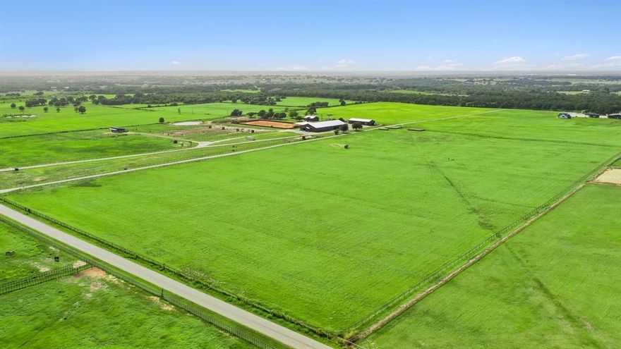 38.519 ACRES OF HIGHLY IMPROVED COASTAL PASTURE !!! FIRST CUT RENDERED 222 ROUND BALES !!! SUPER CLEAN HORSE HAY !!! This tract is located in an excellent location right in the HEART of performance horse country and surrounded by equine experts, trainers, and contestants alike.  WATER WELL & POWER !!