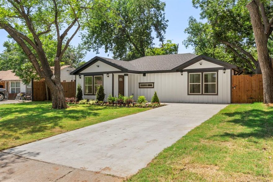 In the heart of Grand Prairie Texas just minutes from AT&T Cowboys Stadium, Texas live! and Six Flags, this beautifully remodeled home offers 3 spacious bedrooms, 2 full bathrooms, and stunning modern upgrades throughout.
Step inside to discover an open layout with fresh finishes, a cozy electric fireplace, and modern lighting and fixtures that elevate every space, every space in this house kitchen have been completely updated with stylish, contemporary details, giving the home a fresh, move in ready feel.
outside enjoy a large private backyard with a brand new fence perfect for relaxing under the porch.
Prime location for an incredible price!! feels like brand new