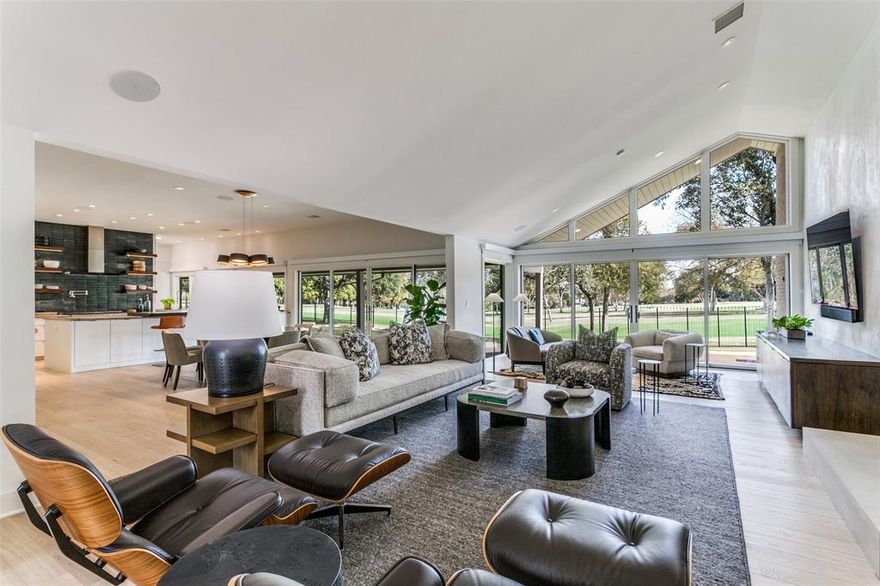 Stunning masterfully reimagined Mid-Century Modern with breathtaking panoramic views of Northwood Country Club Golf course. Taken to the studs in 2019 and extensively renovated by acclaimed designer architect Chad Dorsey with an open concept floor plan and clean-lined luxury finishes.  Legno Bastone European white oak flooring.  Sleek ultra functional chef's kitchen with top of the line Wolf and Sub Zero appliances including 6-burner range-griddle, 2 ovens, steam oven, microwave, 36in Sub Zero column refrigerator and freezer plus 2 Bosch dishwashers. Large center island with exquisite Toberlone Quartzite countertops paired with walnut and ebony accents. Adjacent wet bar with wine cooler and icemaker.  Spacious primary suite with couture custom his her closets. Control 4 Home Automation System for Lighting, Sound System, Electric Shades and Security. Whole house Filtration System, Generator, Foam Insulation, Tankless Water Heaters and more! A rare offering with unmatched golf views!