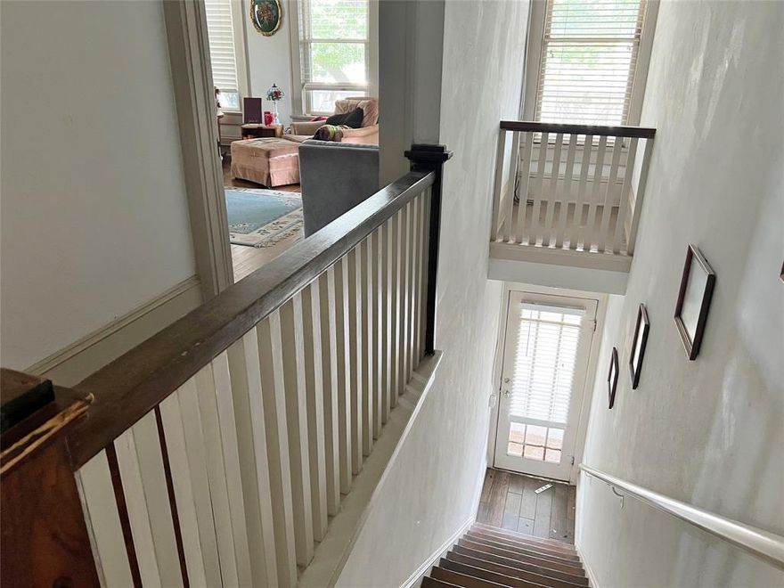 Live in a piece of history! This is the first apartment building in Waxahachie built in 1920 with a perfect mix of charm and modern convenience! This upstairs 2 bedroom unit boasts 2 staircases, tons of storage, original hardwood floors, original claw foot tub, central hvac, with fridge included. Enjoy relaxing on the upstairs balcony, or take a stroll downtown to enjoy all that Waxahachie has to offer! This is a must see! Fireplace is decorative only and not for tenant use. Only pets under 20lbs allowed with owner approval. $15.00 monthly dumpster fee and $20.00 monthly pet fee required in addition to monthly rent.