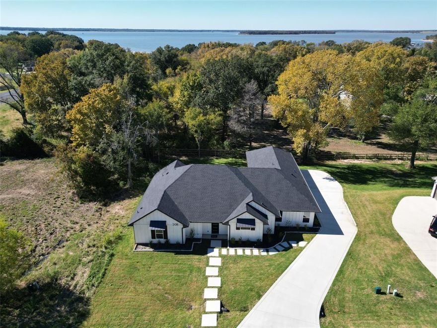 Discover the perfect mix of classic Texas charm and modern luxury in this stunning 2024 custom-built modern farmhouse located in the heart of Mabank, TX. Thoughtfully designed for comfortable everyday living, this spacious home offers 4 bedrooms, 3.5 bathrooms, and a 3-car garage perfect for families, guests, or anyone who loves to entertain.

The open-concept living area serves as the centerpiece of the home, ideal for relaxing movie nights, lively game days, or quiet evenings by the fire. The chef-inspired kitchen features elegant quartz countertops, a large island, double ovens, sleek finishes, and a walk-in pantry, making both cooking and entertaining a joy.

Nestled in a peaceful, established neighborhood, this property offers a true sense of community while keeping you close to Mabank’s most desirable amenities. You’ll love being less than a mile from the nearby country club, complete with a scenic golf course and beautiful lake access perfect for weekend recreation or relaxing afternoons by the water.

Whether you’re hosting friends for a barbecue, enjoying a quiet night in, or exploring Cedar Creek Lake, this modern farmhouse captures the perfect balance of tranquility, convenience, and style.