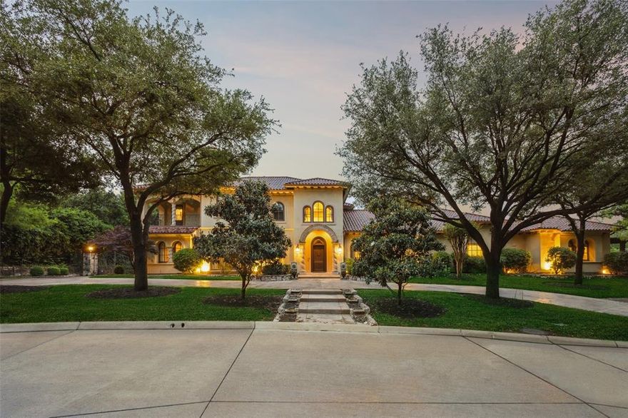 A rare opportunity to own one of the most breathtaking estates in Kings Gate. Situated on an expansive lot with lush landscaping and every amenity imaginable, this residence delivers an extraordinary lifestyle for those who expect nothing less than perfection. From the moment you arrive, the commanding façade hint at the exquisite elegance within. Enter through ornate double doors into a soaring rotunda foyer, where vaulted ceilings and sweeping wrought-iron staircase set a tone of regal sophistication. The formal living and dining spaces are designed to impress and a seamless flow into the butler’s pantry—perfect for hosting elegant dinners or lavish gatherings. The gourmet kitchen is a chef’s dream, outfitted with professional-grade appliances, dual ovens, farmhouse sink, exotic granite, and a massive island at the heart of it all. Multiple living areas, including a cast stone fireplace-framed family room, create warm yet refined gathering spaces, while the executive study offers a stately retreat with coffered ceilings, custom built-ins, and a cozy fireplace. An elevator provides effortless access to every level—including the basement wine cellar, which doubles as a storm shelter, adding both indulgence and peace of mind. The private in-law suite or fully equipped guest quarters offers complete autonomy with its own entrance, kitchen, and bath—ideal for multi-generational living. The palatial primary suite is a private sanctuary, featuring a spacious sitting area and a spa-caliber bath.  A true highlight of the home is the expansive backyard paradise, reminiscent of a European villa. Enjoy a Roman-style pool and spa, terra-cotta fountain, lush manicured grounds, and a private courtyard designed for intimate gatherings or tranquil reflection. Winding pathways, mature trees, and multiple outdoor living areas elevate the sense of peace and grandeur. Completing the estate is a 4-car garage, a state-of-the-art theatre room, all enveloped in privacy and exclusivity.