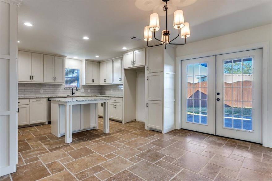 NEW PRICE, REDUCED FOR OPEN HOUSE. MOTIVATED SELLER. Welcome to this beautifully remodeled and updated 3 bedroom, 3 full bath home offering 2,072 sq ft of bright, open living space on just over an acre. The spacious living room features abundant windows and an expansive brick fireplace with a long hearth, creating a warm and inviting atmosphere. A large dining room provides plenty of space for gatherings and entertaining. The updated kitchen includes all new appliances, adding modern convenience to the home. Outdoor living is exceptional with a covered porch and a 30 × 15 patio with a pergola, perfect for relaxing or hosting guests. The oversized detached garage is wired with 220V, ideal for welding, woodworking, or personal projects. Located in the desirable Indian Harbor community, residents enjoy 24-7 gated access with a manned and monitored guard shack, a clubhouse, community pool, playground, and a marina with access to Lake Granbury. A nearby grocery store and café add to the convenience.This well-appointed property offers privacy, space, and fantastic community amenities—ready for its next owners to enjoy.