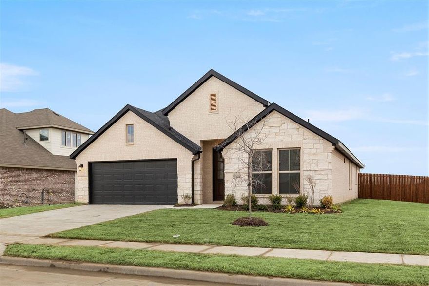 MLS# 20380197 - Built by UnionMain Homes - Ready Now! ~ Welcome to this stunning 1-story home offering 2.052 sq ft of living space. Home includes MOVE IN READY PACKAGE: Washer, Dryer, Refrigerator and Blinds! With 4 beds, 2 baths, and a 2-car garage, this residence has it all. The upgraded gourmet kitchen is a culinary enthusiast's dream come true. Experience the joy of open living and tray ceilings, creating the perfect atmosphere for entertaining guests. Elegant tile plank flooring adds a touch of sophistication to every room. Enjoy the extended patio. This well-appointed home is designed for both comfort and style. Don't miss your chance to own this exceptional property!!