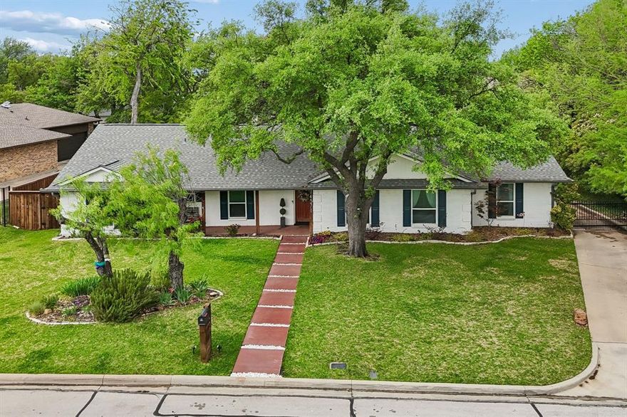 BACK ON MARKET! Welcome home to 14371 Olympic Drive in the heart of Brookhaven Club. Located in a tranquil cul de sac with greenbelt views of the championship golf course combine timeless curb appeal with modern comfort. This inviting residence features an open layout ideal for everyday living.  A welcoming entry leads to the spacious living room with beautiful hardwoods, sunroom for lounging, formal dining area, and a well-appointed kitchen. Ample cabinetry provides great storage. Large island and counter space with built in microwave. The primary suite is a peaceful retreat with generous closet space, attached bath, and pool access; additional bedrooms are comfortable and bright, perfect for family, in-laws, guests, or a home office. Hardwood and tile floors flow through main living areas for easy maintenance.  Bonus room with wet bar offers endless possibilities. Outside, a private oasis with shaded patio, several lounge areas and well maintained heated pool. Pool includes soothing spa feature, perfect for relaxing. The two-car garage and extra storage building add convenience. Solar panels mean huge energy savings for long Texas summers. Recently serviced sprinkler system with app controls make yard maintenance a breeze. New roof and gutters 2026. Alex Nahhas of CMG Home Loans is offering a lender credit of 1% of loan amount see transaction desk for details.