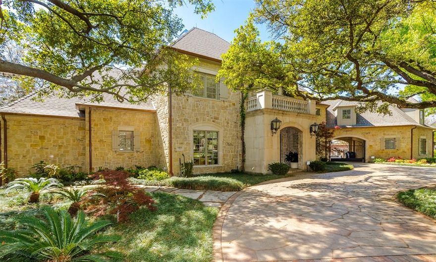 Beautiful sprawling estate in the heart of Preston Hollow sitting on a lush landscaped .5+ acre corner lot. Extensively reimagined in 2021 by esteemed builder Nickey Oates, this 5 bedroom, 5.2 bath home spans an impressive 8,800 square feet. Perfect for an executive, multi-generational living, or a family needing space to spread out.  The first-floor spacious primary bedroom features a fireplace, direct access to the patio and pool, a gorgeous en-suite bathroom with spa-like features, and multiple walk-in closets. Also on the first level is a guest suite, situated on the opposite end of the home, offering peace and comfort for guests. Downstairs boats brand new white oak hardwood floors, stunning foyer, lounge, dining room and study. The gourmet chef’s kitchen has gorgeous quartzite counters, Wolf and Sub Zero appliances, and opens to the large living area and a secluded breakfast patio. A large hidden butler's pantry, beautiful wet bar, and custom wine fridge make for easy entertaining! Lutron lighting systems and Control 4 sound system throughout. Upstairs there are 3 spacious bedrooms, en-suite, an oversized game room, library, media room, a dedicated crafting room, and additional laundry. An oversized upstairs study can easily be converted to a massive 6th bedroom. Also, there are large balconies overlooking the pool. The backyard is perfect for entertainment, with 2 built-in grills, fireplace, a large covered patio, and sparkling pool with spa. A new roof in 2021 and emergency generator show the house is well equipped. Stunning curb appeal with beautifully manicured front gardens, lush grounds, copper rain gutters and much more. A meticulous eye for detail shows with every feature of this magnificent home. Close proximity to Saint Marks, Hockaday, ESD, and all of Dallas' top private schools! It truly is a must-see!