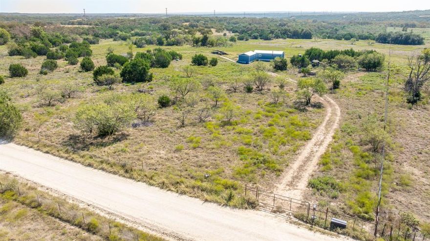32 acres nestled between Hico and Iredell, TX. This property offers quiet country living and energy efficiency. Two tiny running off solar power with a water well and septic system for true off grid living. A turn key property ready for someone to enjoy whether you're looking for a weekend getaway or small family hunting property this one is worth a look. The houses sit back off the hidden by trees for extra privacy with a combo lock on the gate. There's a water line ran to a trough in the pasture for any livestock you would like to bring in. This area offers some outstanding hunting opportunities for the outdoorsman in your family.