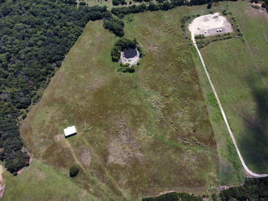 Perfect property if you want seclusion to build your dream home. Gated entry. Spring fed pond. The property has been used as a coastal field, trees at the back of the property and the front. A water well will have to be installed, and septic needed, electricity available . Site built home only with a minimum of 1500 sq. ft living. No pig, hogs or swine.