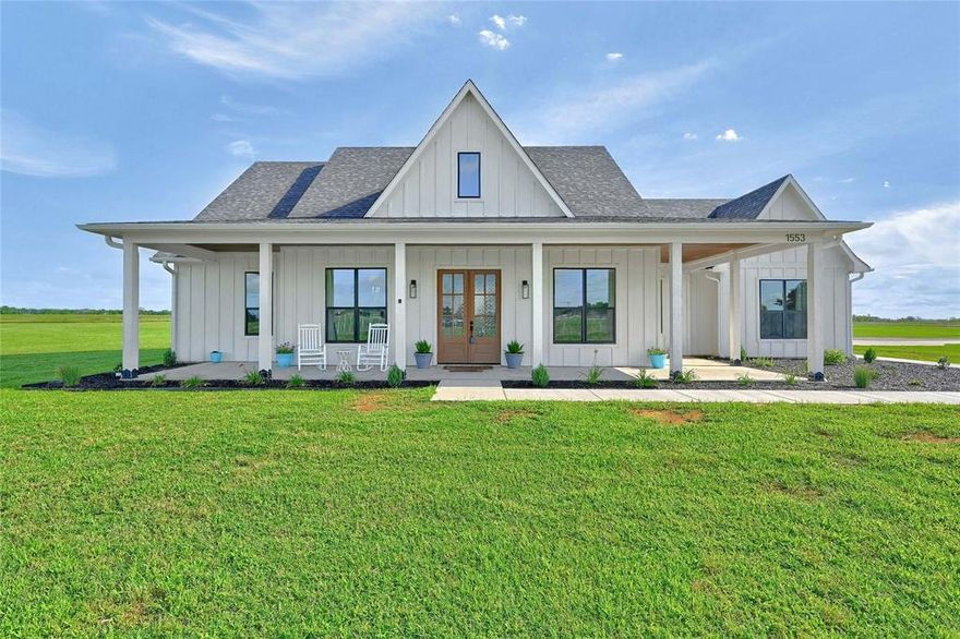 Nestled on 3.689 acres in the serene countryside of Whitesboro, TX, 1553 South Rd. is a charming 2022-built farmhouse offering modern comforts with a rustic touch. This 3-bedroom, 2.5-bath home spans 2,129 square feet, providing ample space for both relaxation and entertainment. The inviting interior features an open floor plan, blending a spacious living area with a contemporary kitchen equipped with modern appliances and a large island, perfect for family gatherings and culinary endeavors. The master suite offers a private retreat with an en-suite bath, while the additional bedrooms are well-appointed for comfort. A standout feature is the home's expansive outdoor space, which includes a small garden, ideal for those with a green thumb or aspirations of farm-to-table living. Sellers recently added in front landscape and a concrete side walk! Surrounded by picturesque views and the tranquility of rural life, 1553 South Rd. offers a unique opportunity to enjoy country living while being just a short drive from the conveniences of Whitesboro.