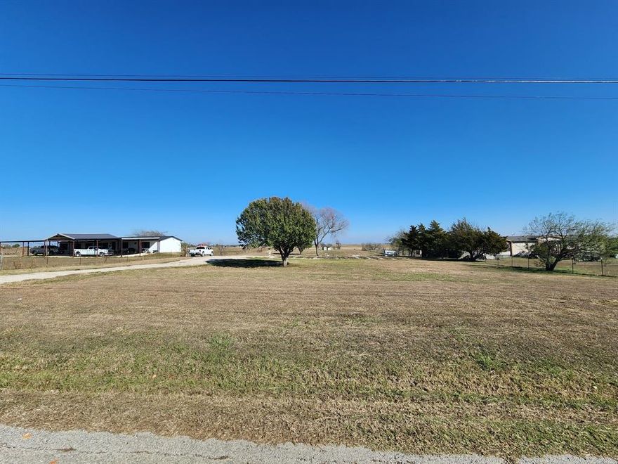 Buyer can put up to 3 homes on this Beautiful 3.14 acre property with No Restrictions located in Alvarado Texas. Owner Financing. Located 30 minutes from downtown Fort Worth, and 5 minutes from I-35!

Mobile homes welcome! Property has 30' x 80' pad for mobile home with concrete runners, water meter, 200 amp electric pedestal, brand New 600 gallon per day aerobic septic system designed large enough for 5 bed 3 bath home, 10 person underground storm shelter, enclosed 7 stall animal corral, gravel driveway with parking area, established trees, and more!
