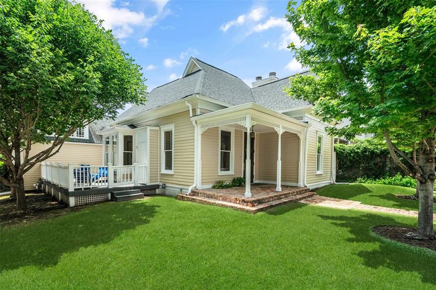 Timeless Victorian masterpiece nestled in one of Dallas’ most coveted and walkable enclaves. Built in the 1930s, this historic home is a rare opportunity to own a piece of the city’s architectural legacy, where vintage charm meets modern convenience — just steps from the iconic Rosewood Mansion on Turtle Creek and the beloved Katy Trail.

From the moment you arrive, you’re welcomed by a gracious entrance porch, setting the tone for the warm, character-rich interiors within. Rich hardwood floors and soaring ceilings whisper stories from a bygone era — offering elegance, warmth, and a sense of place from times past.
The home features three distinct living areas, each with its own charm and purpose. Whether it's the light-filled formal lounge anchored by a fireplace, a quiet living area perfect for reading, or a sun-kissed family room ideal for morning coffee, the spaces invite both relaxation and conversation.

The dining room includes a unique bay window and is designed for entertaining. The kitchen features custom cabinetry and a wet bar that blends vintage character with an inviting layout. The expansive owners suite is a true retreat, vaulted ceilings, warm hardwood floors and a cosy corner fireplace combine to create a blend of comfort and sophistication.

Outside, the private elevated deck is shaded by mature trees, offering a serene escape to enjoy the character of the neighborhood. Just a short walk to the Katy Trail, fine dining, boutique shopping, and Dallas’ most iconic cultural institutions — this home blends walkability with charm in a way that’s increasingly rare.

Whether you're a lover of history, architecture, or simply a sense of soul in your surroundings, it is more than just a home — it’s a living piece of Dallas history waiting for its next chapter.