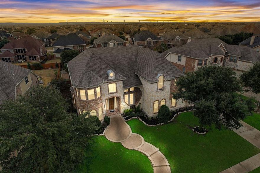 This One-Owner Drees Custom Home is a true gem. Located on the prime, waterfront boulevard of Mira Lagos, providing an exceptional blend of upscale living with warmth and friendliness of this unique community. Luxurious touches and 21-foot soaring ceilings create an Opulent Miniature Castle bathed in natural sunlight. The gourmet kitchen is a haven for epicureans, featuring a professional-grade 6-burner Gas Cooktop, double ovens, storage island and wood cathedral ceiling--creating the perfect blend of functionality and aesthetics. The Primary Suite offers a jetted soaking tub, spa shower, dual vanities, and two walk-in closets. A secondary bedroom and bath on the first level with a walk-in shower provide versatility, making it suitable as a Second Primary or Nursery. Upstairs are three large bedrooms plus Game and Media Room. Perfect for hosting movie nights for family & friends. The outdoor, private oasis features covered patio and heated saltwater spa pool. Roof less than 5 yrs. old.