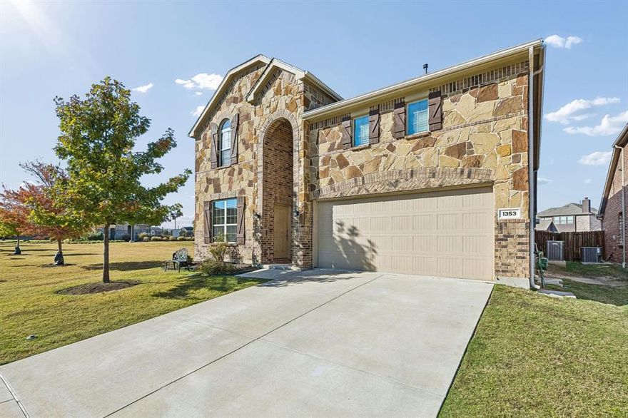 WELCOME HOME to 1353 Lake Grove! This rare LIBERTY NEXT GEN floorplan in highly sought-after Northlake Estates offers exceptional versatility, featuring a full Mother-in-Law Apartment with a private entrance, separate living area, bedroom, and bathroom—perfect for multi-generational living, guests, or rental income. Step into your Backyard Paradise on an oversized quarter-acre lot ideally positioned next to the community pool and playground. Enjoy an impressive 25' x 25' cedar-covered patio (added in 2020), charming garden space, and convenient rain barrels. With this much room, you can easily add a sports court, private pool, or create your dream outdoor retreat. Inside, the gourmet kitchen shines with a large island with seating, gas cooktop, stainless steel appliances, tile backsplash, and a bright breakfast area. The serene primary suite features an ensuite with dual sinks, garden tub, separate shower, and a spacious walk-in closet. This functional layout also includes a guest bedroom with a full bath on the main level, perfect for visitors or extended family. Upstairs, you’ll find an oversized game room with a half bath, a dedicated media room, and two additional bedrooms connected by a dual-vanity bathroom. A separate utility room is conveniently located downstairs. Additional Updates include a NEW ROOF in 2024. Northlake Estates offers fantastic amenities - Pool, Greenbelt, Playground, and Walking trails—and an unbeatable location near Hwy 380, DNT, shopping, dining, and Lake Lewisville.