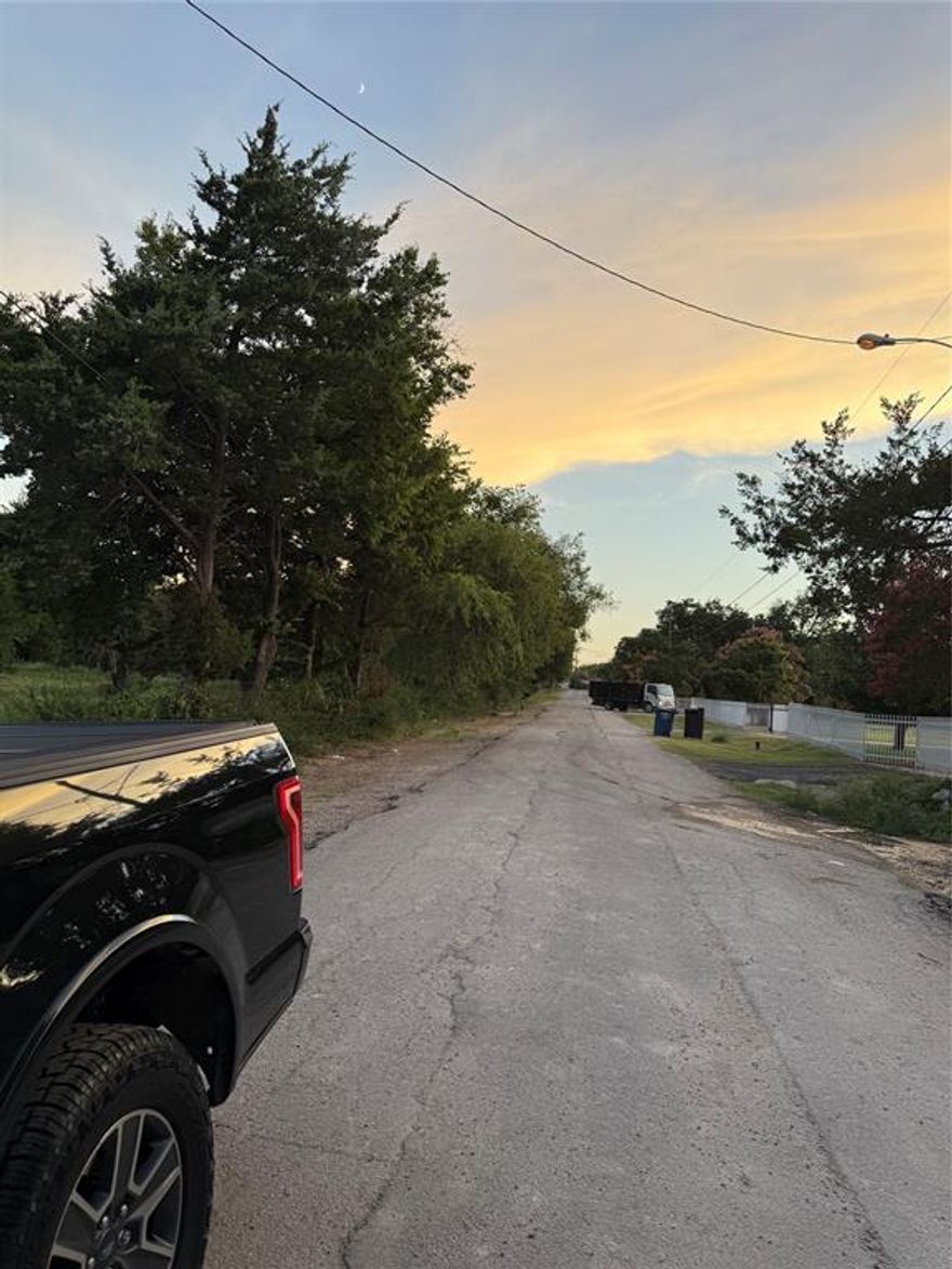 A 5-Acre residential parcel that may be subdivided-replated into new subdivision subject to Dallas Planning & Development setback requirements.  The property has frontage on two streets with a creek. Wherefore, the new site plan may allow for subdivision entry from both sides of the creek - Memory Lane Blvd and Baraboo Dr.