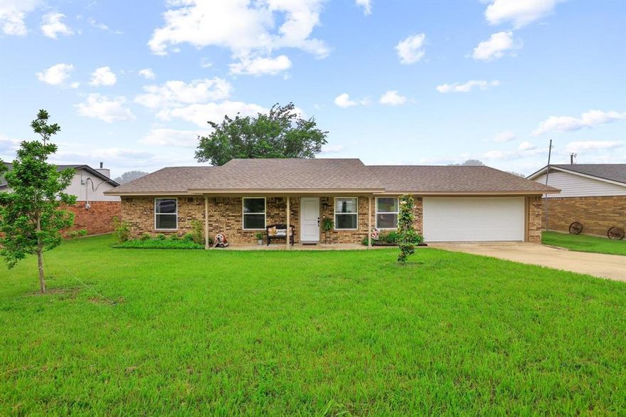 Tucked away in a welcoming neighborhood, this beautifully updated home offers comfort, style, and outdoor living at its best. Inside, you’ll find fresh updates that create a warm, move-in-ready space perfect for both relaxing and entertaining. Step outside to enjoy the standout feature—a spacious covered back porch, ideal for morning coffee, evening gatherings, or simply unwinding year-round. The fully fenced backyard provides privacy and plenty of room for pets, play, or gardening. This home blends modern touches with everyday functionality, making it a perfect fit for anyone looking to enjoy both indoor comfort and outdoor charm. Every inch of this home has been thoughtfully updated in recent years including fully updated HVAC, hot water heater, and energy-efficient windows and doors. Two car garage to keep your vehicles safe and secure during this Texas weather! Absolutely turn key and ready for you to move right on in.