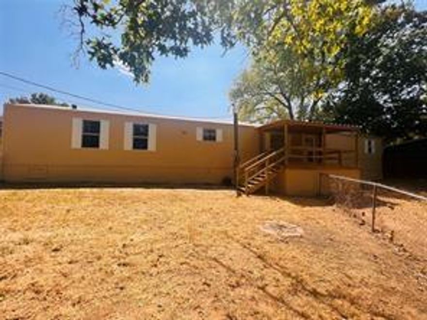 This three bedroom, two bathroom home has been recently remodeled and is MOVE IN READY! Located on a quiet, dead end street, this home sits on four lots totaling just under half acre. Recent renovations include exterior siding, interior and exterior paint, vinyl plank flooring throughout, front and back porch decking, bathrooms and much more! Open concept living space with a split bedroom arrangement. Large, covered front porch with nature views. Storage shed and fenced in yard. Additional parking area recently installed providing ample space for cars, boats, or other toys! Hiland Shores community has a boat launch and beach access.