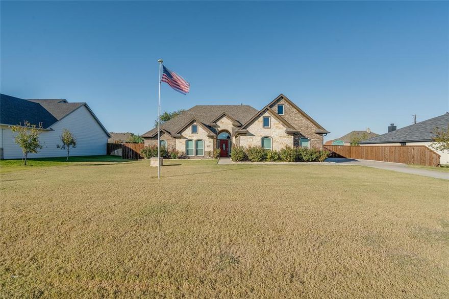 Welcome to this gorgeous home on an oversized lot in the sought after Aledo ISD! Designed for both comfort and convenience, this home features an open layout with stylish finishes and a cozy fireplace at the heart of the living space. With three bedrooms plus an office or flex space, the owners’ suite retreat with spa-like bath, and a spacious grassy backyard, this home has it all. Recent improvements make this property truly stand out. The extended concrete patio provides plenty of room for entertaining, while the additional 50 amp circuits make it RV and generator ready perfect for today’s lifestyle needs. Other thoughtful upgrades, from a widened driveway to a dedicated barn door office entry, add both style and function throughout the home. Inside, you’ll also find upgraded appliances, including a double oven and sleek LG dishwasher, adding both beauty and practicality to the kitchen. This property won't last long, call to set up your showing today.