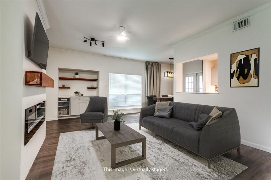 Tucked inside a quiet courtyard, this beautifully updated 2 bed-2 bath ground-floor corner unit offers rare privacy, a generous floorplan, and a spacious fenced patio perfect for morning coffee or container gardening.

Step inside to an inviting open layout with abundant natural light, and a living room anchored by a cozy linear fireplace. The dining area flows effortlessly into a well-appointed kitchen featuring quartz countertops, stainless appliances, and ample storage — ideal for everyday living or hosting friends.

Both bedrooms are generously sized with large closets, and each bathroom has been thoughtfully updated. A spacious laundry closet adds convenience not typically found in condo living.

Enjoy secure, low-maintenance living with a community pool, greenbelt access, reserved parking, and close proximity to NorthPark Center, Top Golf, Texas Health & Presbyterian Hospital, SMU, the DART rail, and endless shopping & dining options.

Welcome home to effortless Dallas living.  Also listed for sale MLS 20917963.