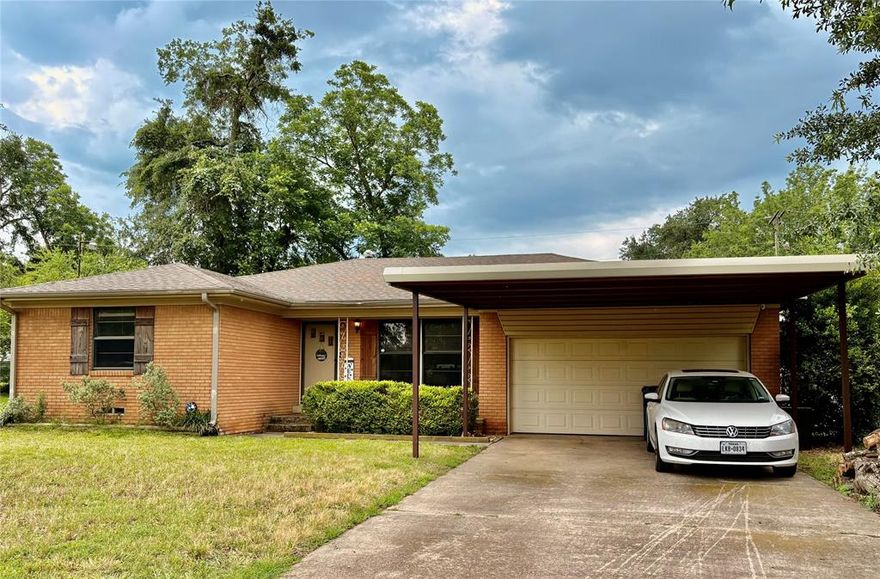 *SELLERS CONCESSIONS & PRICE IMPROVEMENT* Seller is now offering concessions of $2,000.00 for the buyer to be used however they choose ( closing cost, future updates, etc.) 
 In this well maintained 3 bedroom brick home you will find plenty of space to enjoy with a huge (24x29) Den - Family room that features a beautiful stone wood burning fireplace with insert, wet bar and vaulted ceilings with wood beams. This room also features plenty of windows for all the natural light anyone  could ask for. The back door opens up to a large (21x23) covered patio that checks all the box for private cookouts and entertaining at its best. As you enter the front door please don't overlook the beautiful wood flooring in the living room or office area that extends thru to the bedrooms. The kitchen has all you could need with a breakfast bar and space for an eat in kitchen area. The chainlink fenced backyard provides a safe place for kids to play and pets to run, a small multi use storage building is also there for your use. A new carport was added in 2024 to provide additional covered parking, as well as the traditional garage. Located across from the middle school allowing for plenty of room for walking, exercising and family enjoyment.