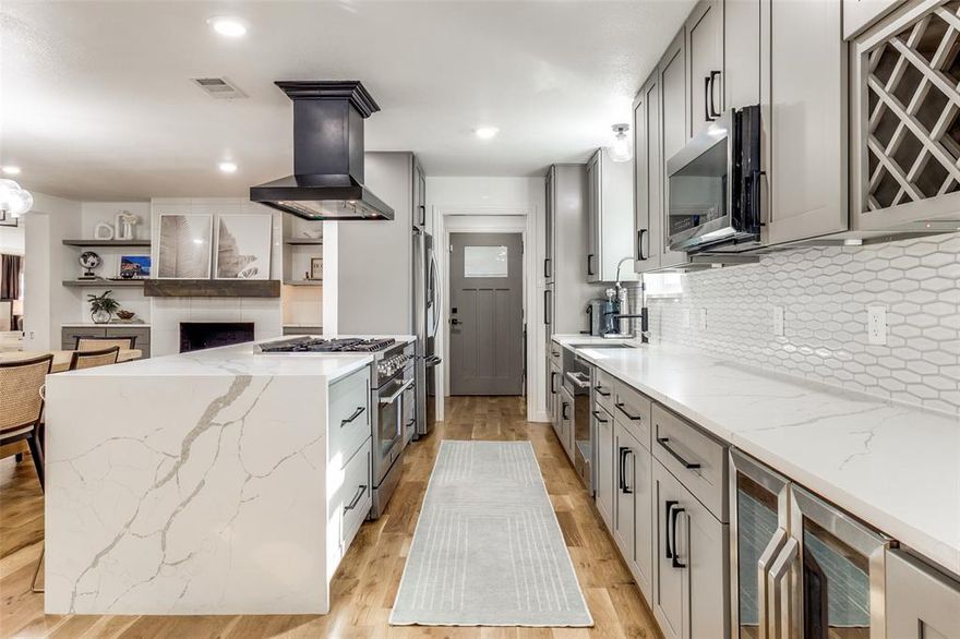 The best value in the neighborhood for size & updates! Welcome to 2808 Sharpview Lane, a completely renovated home that’s an instant crowd pleaser. The open-concept kitchen, living, and dining area is designed for effortless entertaining, anchored by a fireplace and a large picture window overlooking mature oak and magnolia trees. This 4-bedroom, 3-bath home features a sought-after double primary layout, with two bedrooms offering ensuite baths. The primary suite is impressively spacious and feels like a true retreat, complete with a spa-style wet room bathroom where a soaking tub sits inside the shower enclosure. One guest bedroom functions as a second primary, featuring its own bathroom and a full wall of closets. Outdoor living shines with a pergola-covered kitchen equipped with a grill, gas burner, mini fridge, and storage—perfect for hosting or relaxing at home. An automatic gated driveway adds privacy, while the basketball hoop brings a fun finishing touch.

Stylish, functional, and made for entertaining—this home truly delivers.