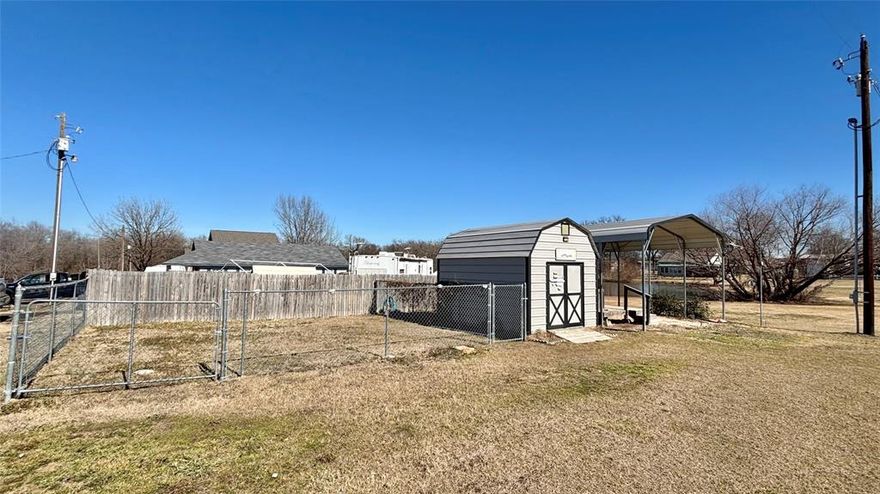 Discover the perfect blend of comfort, recreation, and community living in the gated Holiday Villages of Fork. This desirable corner lot sits next to a stocked fishing pond and offers prime waterfront access within a vibrant Lake community. Residents enjoy exclusive use of two fishing piers and two boat ramps, making it ideal for anglers and boating enthusiasts alike.

The property is thoughtfully set up for RV living and outdoor enjoyment, featuring a chain-link fenced dog run, privacy fencing between neighbors, an RV carport with decking, and a convenient garden shed. A full RV hookup is already in place with a water spigot, sewer pump, and electrical panel—ready for immediate use.

A mandatory HOA fee of $52 per month provides access to exceptional community amenities. Community well water filtration and sewer facility services are available at $65 each per month, plus usage. Community features include fishing piers, boat ramps, a clubhouse, saltwater pool, playgrounds, picnic areas, and an active social calendar with events such as potlucks, bingo, karaoke, and paint classes.

Seize this remarkable opportunity to embrace the Lake lifestyle in a secure, welcoming community where relaxation and recreation come together. Your vision for a peaceful retreat—or an adventure-filled escape—can become a reality here.