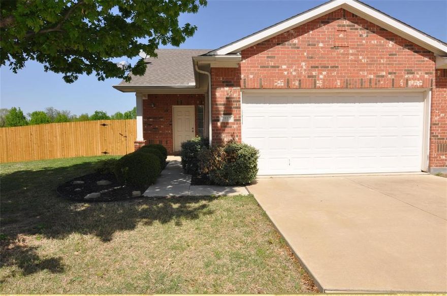 This gorgeous duplex offers a perfect blend of comfort and convenience. Located near 35W and 820 North, it’s just minutes from restaurants, shopping, and schools. Featuring 2 bedrooms, 2 full bathrooms, and a 2-car garage, this home is ideal for entertaining with an open kitchen flowing into the living and dining areas. Ceramic tile is installed in all wet areas, and wood-like plank flooring extends throughout the family room, dining area, and hallway. Both bedrooms include spacious walk-in closets. Enjoy a low-maintenance lifestyle with front yard care included. The fenced backyard features a full sprinkler system, a side porch, and a covered patio, perfect for relaxing outdoors. This home backs up to a serene creek and is on the best lot in the neighborhood. It has 30 year roof, offering long-term durability. For an annual HOA fee of $484, front yard mowing and trimming are included. This home is move in ready.