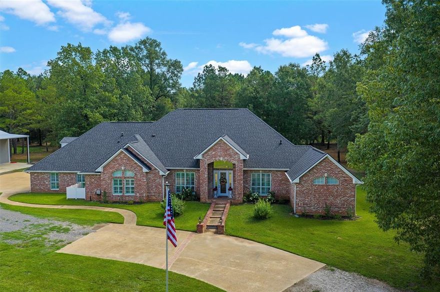 Welcome to your own retreat tucked away on  10 picturesque acres in Benton with POND and guest house!  This beautifully renovated estate combines modern convenience, offering everything you need for both peaceful living and entertaining on a grand scale. Featuring spacious bedrooms, 3 full bathrooms,a large gameroom or fourth bedroom, two additional living areas, a dedicated office, and a formal dining room, this home was thoughtfully designed to accommodate the needs of both family and guests. Outside every persons dream workshop with office, bedroom, combination suite with full bath.Inside,the heart of the home is the incredible open floor plan, anchored by a chef-inspired kitchen. With double islands, abundant cabinetry, and updated finishes throughout.Natural light in every corner, highlighting the warm interiors while blending the modern updates with the character of a country home.An expansive 45-foot back patio sets stage for sunsets and weekend cookouts.Just beyond, a sparkling pool invites you to cool off during warm Louisiana summers.For those with hobbies or business needs, the impressive shop is a true showpiece,complete with double overhead doors, foam insulation, and rear covered trailer storage. Whether you need to house an RV, pursue woodworking,or bring your outdoor projects to life,this space delivers unmatched versatility. ttached to the shop is a fully finished guest quarters or office with a private entrance and full bath,offering options for multigenerational living,working from home,or hosting overnight visitors in comfort. Every inch of this property has been crafted for lifestyle,convenience, and comfort.Recent renovations ensure modern style,with acreage providing the tranquility & privacy that only country living can offer,all just minutes from the conveniences of Benton.Experience the upgrades with whole home generator,water purification, leaf filter gutters, and private electric gates at the front for added security.Floorplan attached
