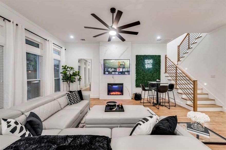 Basically brand-new construction just south of Downtown Dallas! This beautifully designed two-story home offers 5 bedrooms and 2.5 baths, with one bedroom perfectly suited for a home office or flex space. Hardwood floors and decorative lighting create a warm, inviting atmosphere throughout. As an added bonus, the home may be sold fully furnished with stylish, curated pieces—allowing the next owner to move right in or capitalize on a turnkey opportunity with an acceptable offer. 

Step outside to a private backyard designed for unforgettable gatherings and everyday enjoyment. Highlights include an above-ground pool, hot tub, fire pit with lounge seating, and a covered gazebo featuring an outdoor TV and grill. Indoors, the large open living area is perfect for games, movie nights, and entertaining, complete with a Pac-Man arcade and record player.

The spacious kitchen features abundant counter space, ideal for cooking, hosting, and entertaining. The open living room is filled with natural light from oversized windows overlooking the expansive backyard, enclosed by an 8-ft cedar privacy fence.

The primary suite is generously sized and includes a spa-like bathroom with dual sinks, ample countertop space, a separate soaking tub, and a walk-in shower. The home also offers excellent storage and a thoughtful layout designed for both comfort and functionality.

Conveniently located near Downtown Dallas, dining, and entertainment, this home truly offers the best of modern living and lifestyle.