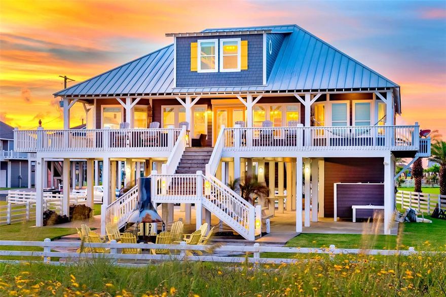 Spectacular Beach View from this front row Masterpiece. Bonus feature.. the neighbors to the West are buffered by a buy out lot. Owners splurged on Authentic wood floors for this beautiful house along the coast. Nationally acclaimed designer Melinda James assisted in November 2020 renovations. They proudly boasted other designer originals such as Living Room Chandelier by Aidan Gray of Aidan Gray Interiors. Custom decorative planters with Custom remote drapes, Hik Connect security cameras, luxury side by side Thermador, wet bar with ice maker and wine chiller, Yamaha received abs subwoofer; outdoor Firepit is a buoy that was inverted cut in half.