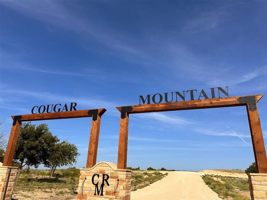 Beautiful 2 acre lot with sloping back, which creates a 360 degree view. Property overlooks the beautiful True Grit Ranch. Property POA dues include access to an amazing 6 acre on the water access to Lake Granbury. Just 15 minutes away, this 6 acres community is exclusive to the Cougar Mountain Estates neighborhood. It includes a clubhouse, fishing dock, boat dock, arbors and pickleball court. So much green space for making a day of being at the lake.