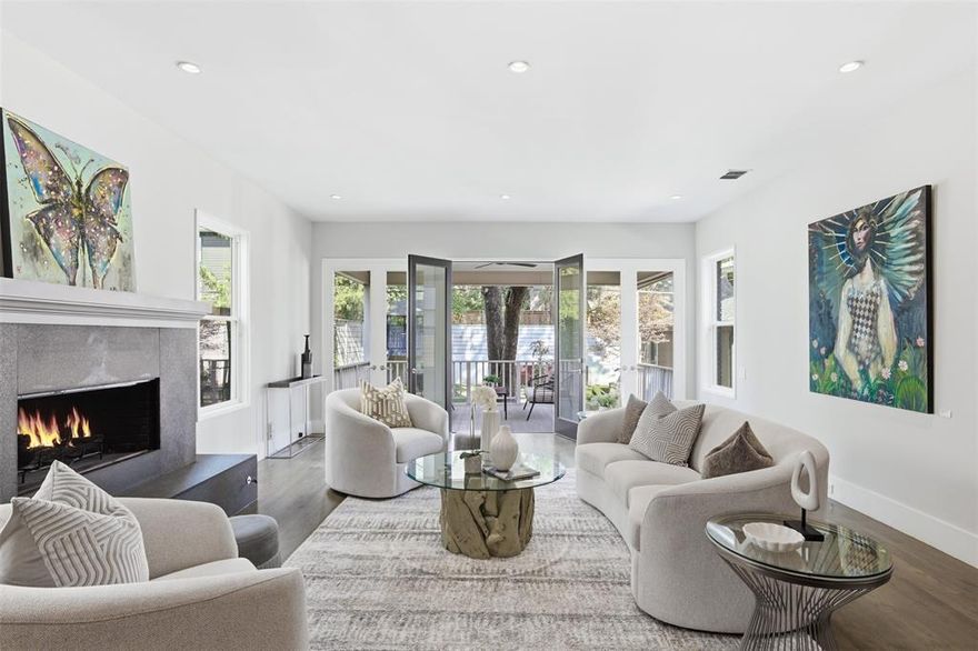 Welcome to Lakewood, where we are redefining expectations. This is the rare property that seamlessly blends the historic gravitas of a classic original Tudor facade with the stunning, deliberate drama of a modern home. The complete transformation, spearheaded by Architect Paul Jankowski, AIA in association with Jay Magee several years ago, introduced clean modern interior lines that create an unparalleled sense of light & space. Step inside & feel the atmosphere shift. The generous, open concept living areas are immediately inviting, anchored by a truly spectacular chef’s kitchen. Forget the single island; this space features a commanding double island, offering maximum prep space & casual seating, all surrounded by a top-tier built-in appliance package. Skylights are intentionally placed throughout the home, drawing in natural light & highlighting the architectural detailing at every turn. The floor plan is exceptionally well thought out for today's lifestyle. It boasts 4 large bedrooms & 3 full, 1 half baths. The main level hosts a secluded first floor guest suite, perfect for in laws or visitors who need easy access. For cozy evenings, the home provides 2 fireplaces, ensuring warmth & ambiance during the cooler North Texas months. The upper level is crowned by the magnificent, private treetop master retreat. This space truly feels like a getaway, offering peace & tranquility high among the neighborhood canopy. For outdoor enjoyment, a substantial covered porch extends the living space outside. Beyond the impeccable design, the location is simply unbeatable. This address places you within easy walking distance of the recreational paths of White Rock Lake & the beautiful green space of Tokalon Park. Families will appreciate the prized zoning to the highly rated Lakewood Elementary. This property delivers exceptional architectural vision, an intelligent floor plan, & an unbeatable lifestyle in one of DFW's most desirable neighborhoods.