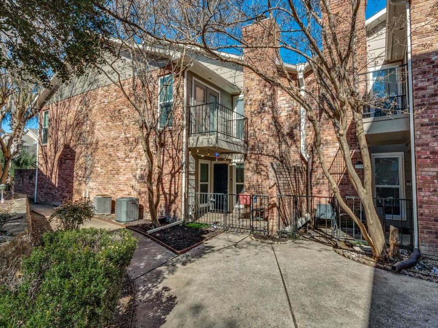 Holly Park is a peaceful private, gated community in North Dallas. This beautifully updated 2-bed, 2.5-bath condo has modern comfort and a prime Dallas location. Beautiful wood floors and large fireplace make the living area warm and inviting. If you love to cook, you will love this kitchen with upgraded modern granite and has updated backsplash and appliances.  The whole place has bright neutral tones to go with any decor. For convenience the half bath and laundry are located on the first floor. Upstairs are 2 bedrooms and 2 full bathrooms; the master has a private balcony and both bedrooms feature lots of closet space.  Private gated patio with lots of space for relaxing, there is a convenient outside storage closet as well. Community has a great pool for summer swims. You are steps from the SOPAC Trail, Whiterock Lake and close to everything Dallas. Just a few miles from North Park Mall and SMU. Come visit us and she why we love The Holly Park Community!