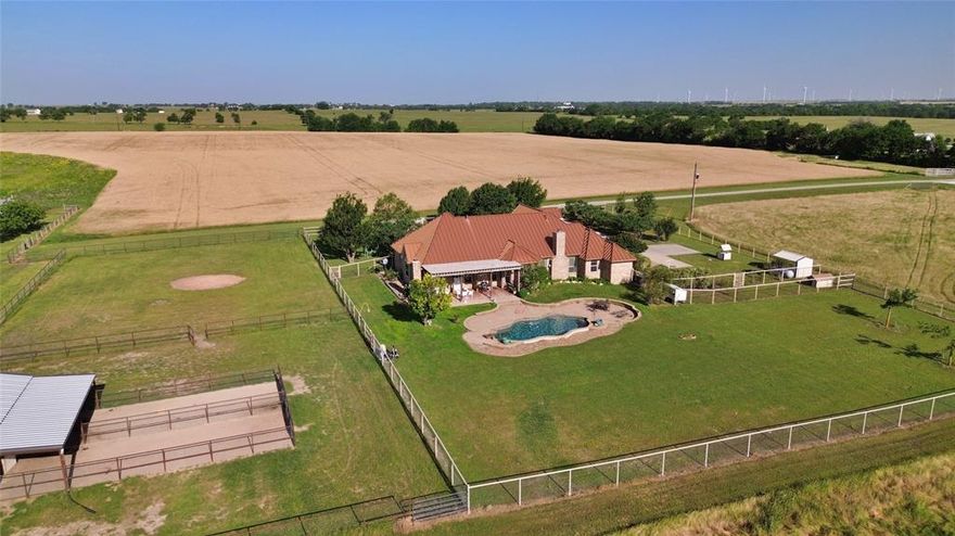 Move to the country and be the proud new owner of this 57 acre property located 1.5 miles from the Era community. The home, with 10 foot ceilings, custom trim and cabinets, and plenty of room for the family, also features a swimming pool, outdoor living area, and an upstairs bonus room. A 40x60 insulated workshop with epoxy floor has water and electricity as well as a car lift.  The 36x36 barn has a wash bay, tack room, and 3 stalls, and a hay barn stores the feed.  One of the two ponds features a gazebo, a pavilion with a bar and restroom, and a dock.   Cross fenced for rotating livestock. 30 acres are in cultivation with the rest in native pasture.  Good set of cattle pens, as well as a pen for just about every variety of animal you can think of! Dog pen, chicken pen, horse pens, cattle pens and more!  Great place to make your homestead dreams come true. Two water wells supply the entire property, and there are two septic systems. Approx 2000 feet of county road frontage!